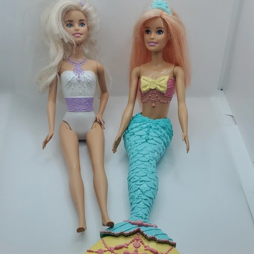 Mattel Dolls with Blonde Hair and Colorful Outfits
